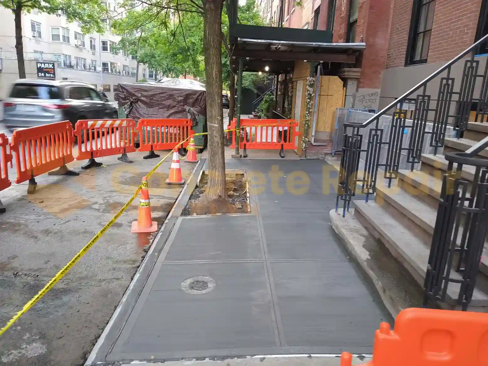 A colorful patterned concrete patio, showcasing the difference between stain and paint finishes.